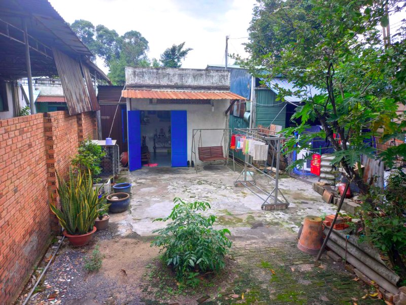 Nhà MT C4 + 20 P.Trọ 1049m2, nở hậu, Đ.32m Quốc Lộ 1A TĐ